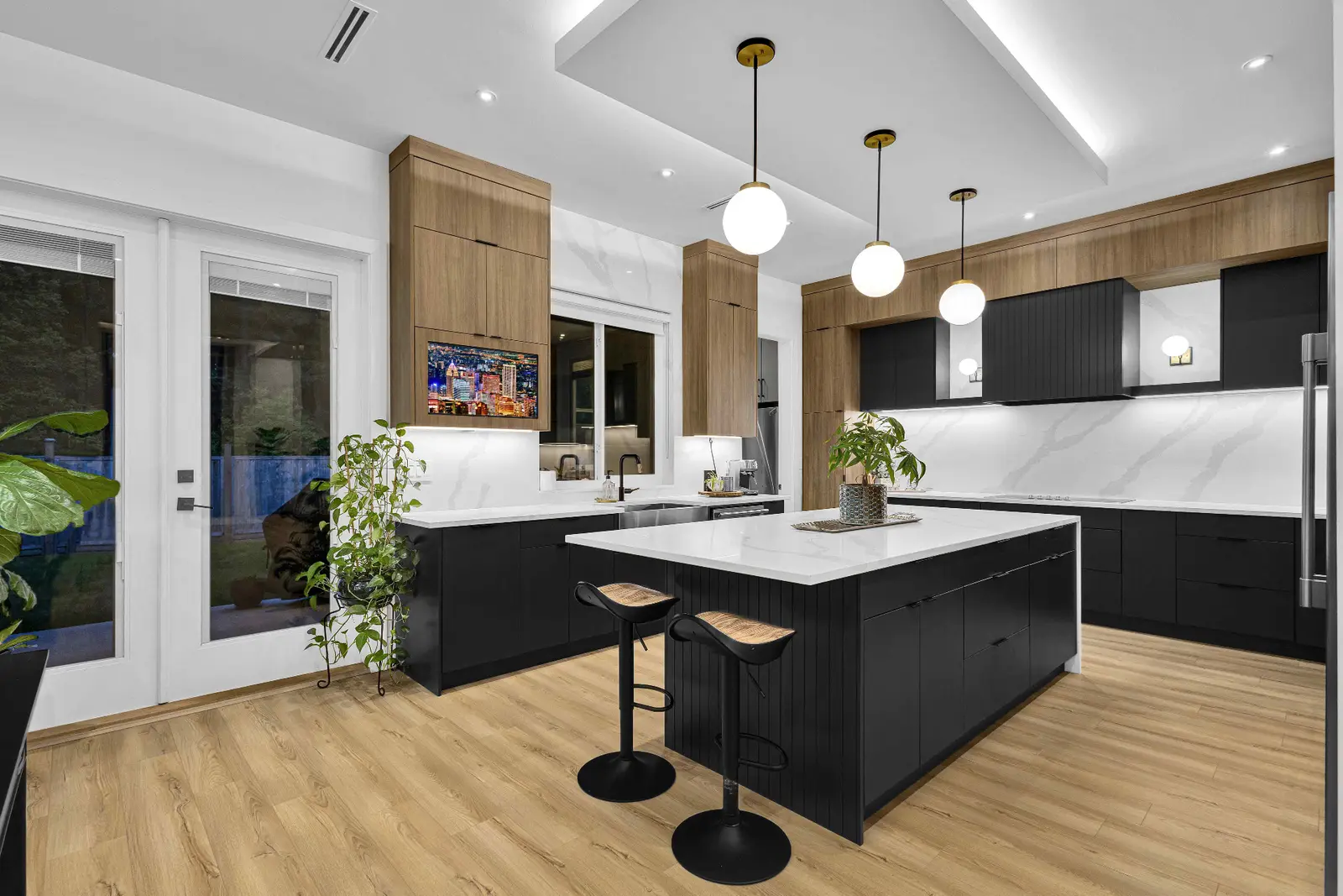 Brightly lit secondary basement suite living area and kitchen with clean modern finishes in a Surrey home