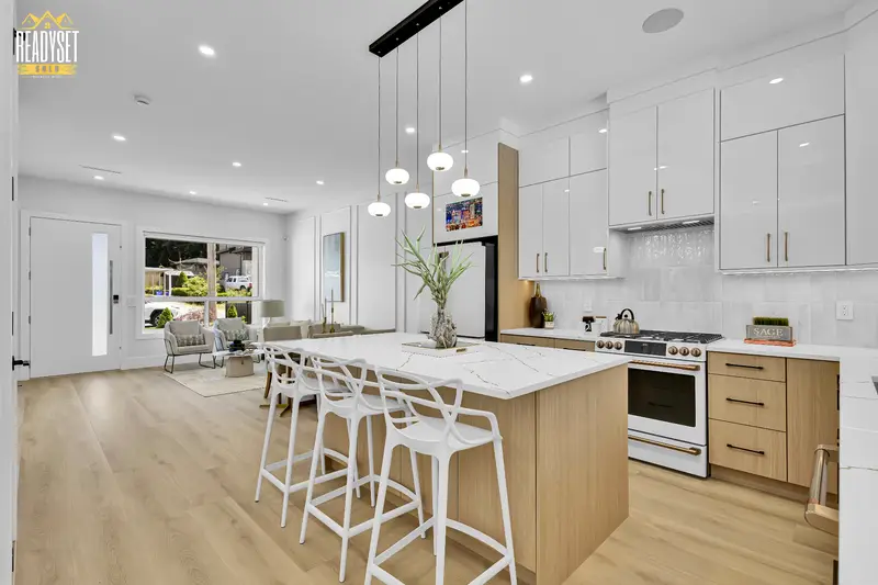 Open-concept kitchen and living room in a brand-new Sunshine Hills duplex, North Delta BC