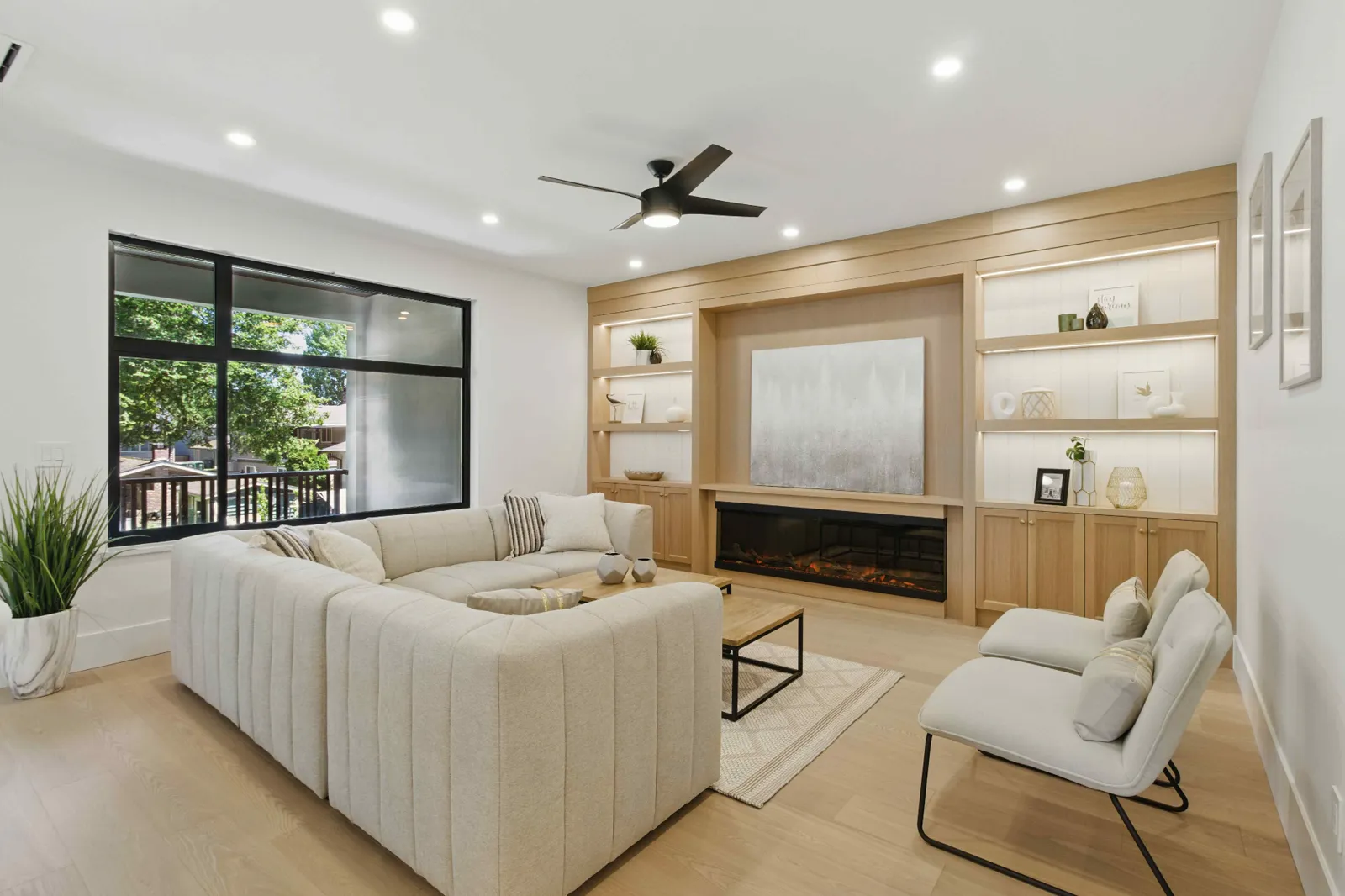 Professional living room photography with built-in fireplace feature