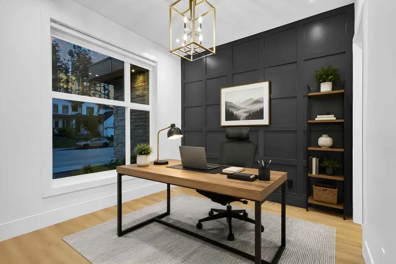 Virtually staged home office with dark panel feature wall and warm lighting